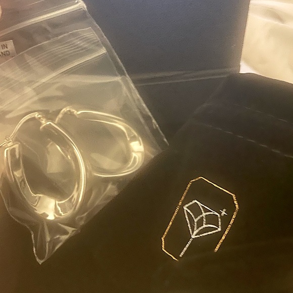 MAX + STONE sterling silver hoops with a twist. - Picture 2 of 3